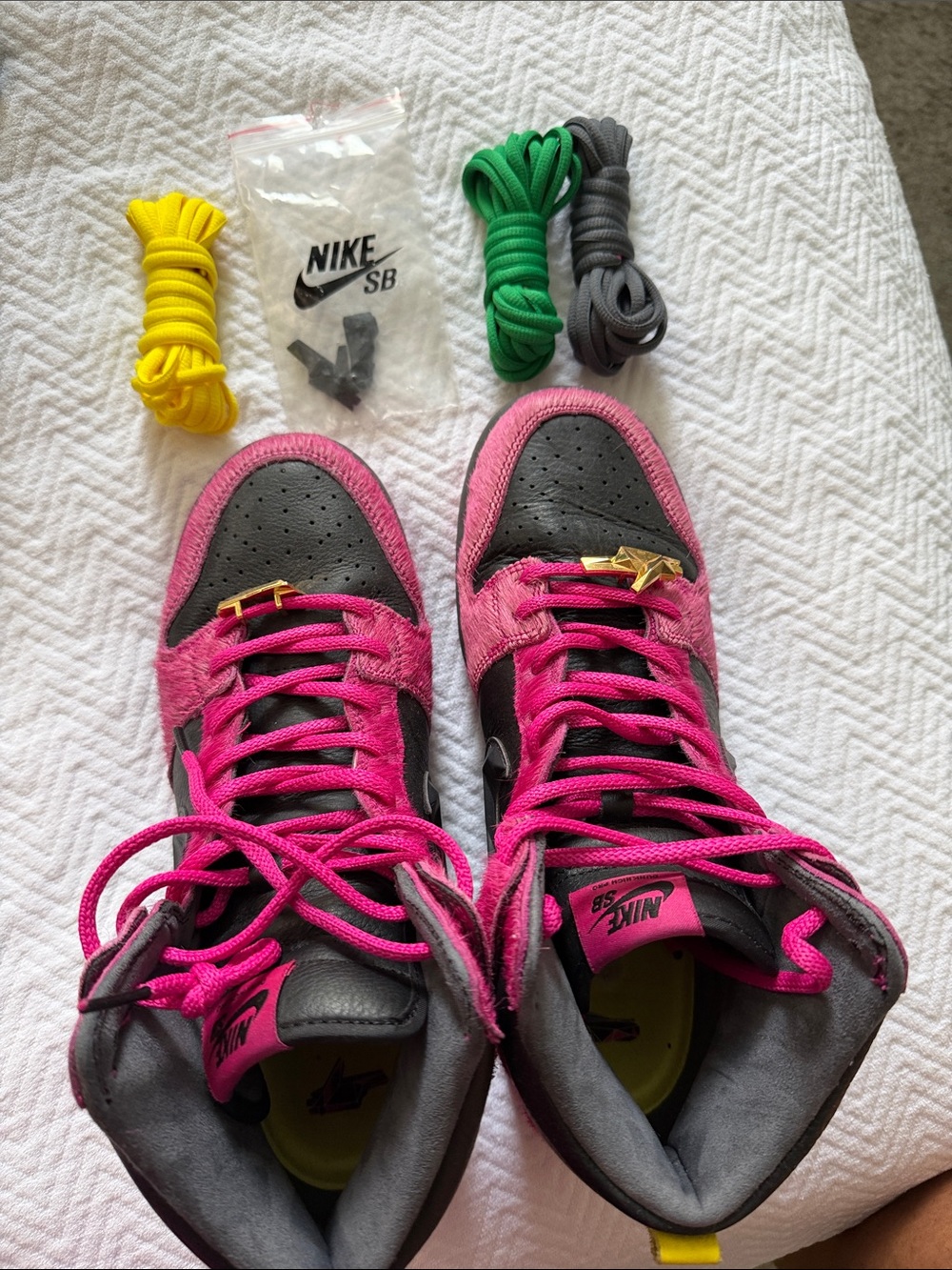 Nike high-top skate sneakers in pink, black & yellow